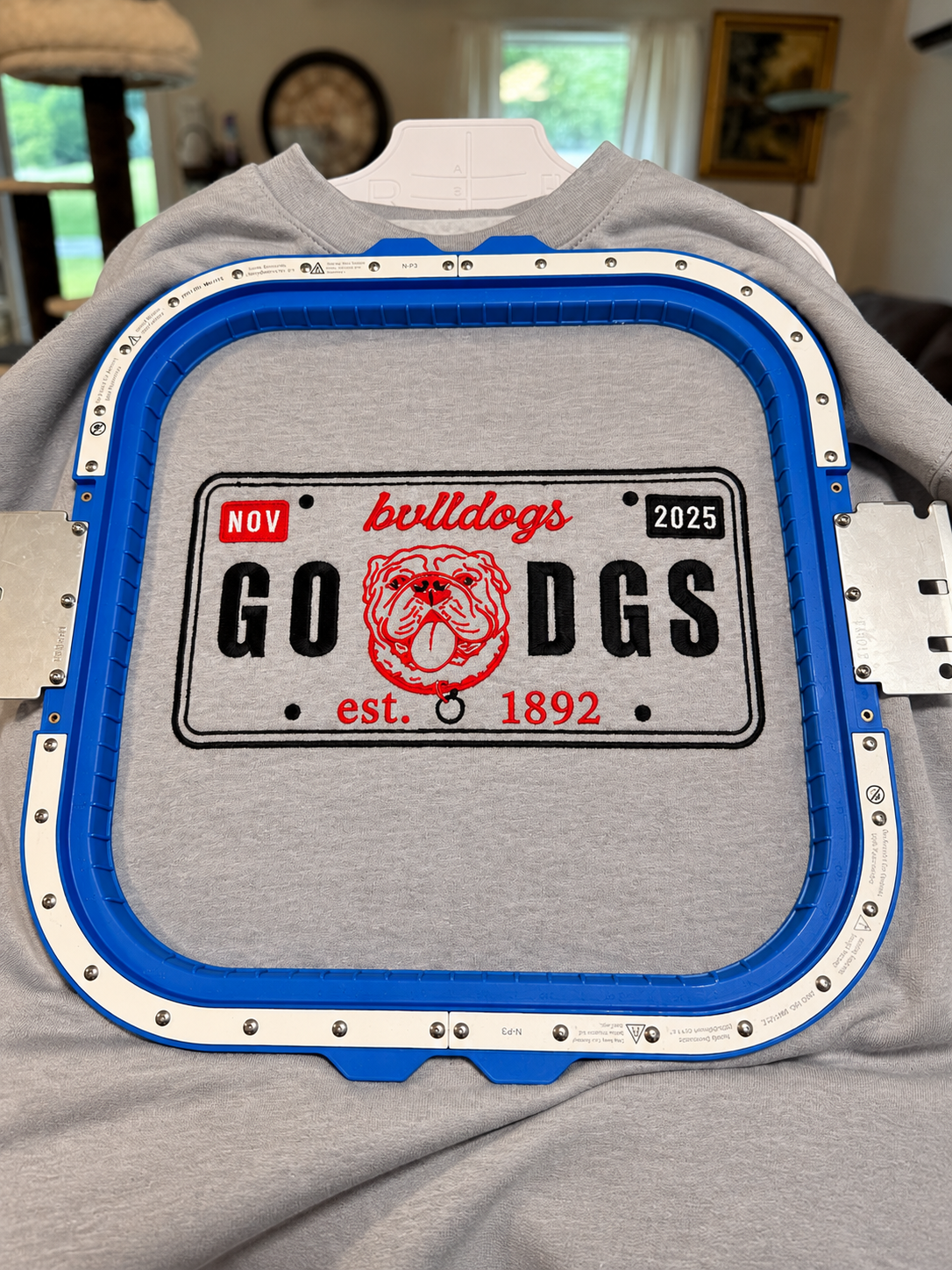 Go Dawgs license plate embroidery on heather gray sweatshirt
